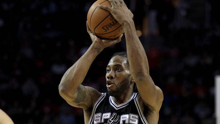 Nov 12, 2016; Houston, TX, USA; San Antonio Spurs forward Kawhi Leonard (2) pulls up for a long jump shot against the Houston Rockets during the first quarter at Toyota Center. Mandatory Credit: Erik Williams-USA TODAY Sports