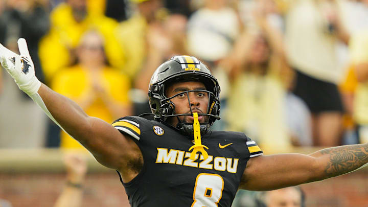 Oct 11, 2025; Columbia, Missouri, USA; Missouri Tigers defensive end Damon Wilson II (8) celebrates after recovering a fumble during the second half against the Alabama Crimson Tide at Faurot Field at Memorial Stadium. Mandatory Credit: Jay Biggerstaff-Imagn Images
