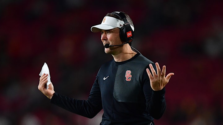 Sep 20, 2025; Los Angeles, California, USA; Southern California Trojans head coach Lincoln Riley watches game action against the Michigan State Spartans during the second half at the Los Angeles Memorial Coliseum. Mandatory Credit: Gary A. Vasquez-Imagn Images Sep 20, 2025; Los Angeles, California, USA; Southern California Trojans head coach Lincoln Riley watches game action against the Michigan State Spartans during the second half at the Los Angeles Memorial Coliseum. Mandatory Credit: Gary A. Vasquez-Imagn Images