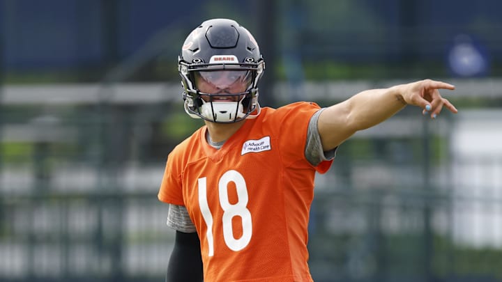 Jul 24, 2025; Lake Forest, IL, USA; Chicago Bears quarterback Caleb Williams (18) signals during training camp at Halas Hall. Mandatory Credit: Kamil Krzaczynski-Imagn Images