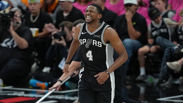 May 22, 2026; San Antonio, Texas, USA; San Antonio Spurs guard De'aaron Fox (4) reacts after an injury against the Oklahoma City Thunder in the second half during game three of the western conference finals for the 2026 NBA playoffs at Frost Bank Center. Mandatory Credit: Daniel Dunn-Imagn Images