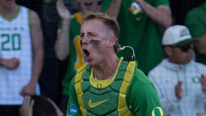 Oregon catcher Burke-Lee Mabeus celebrates an out at the plate against Oregon State on day three at the NCAA Eugene Regional Tournament at PK Park in Eugene May 31, 2026