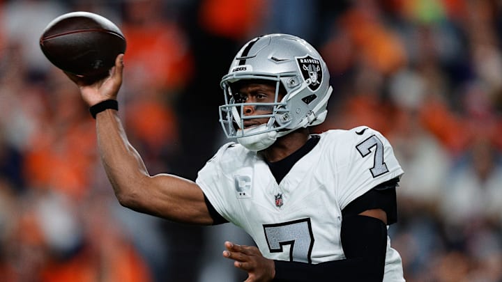 Nov 6, 2025; Denver, Colorado, USA; Las Vegas Raiders quarterback Geno Smith (7) attempts a pass in the second quarter against the Denver Broncos at Empower Field at Mile High. Mandatory Credit: Isaiah J. Downing-Imagn Images