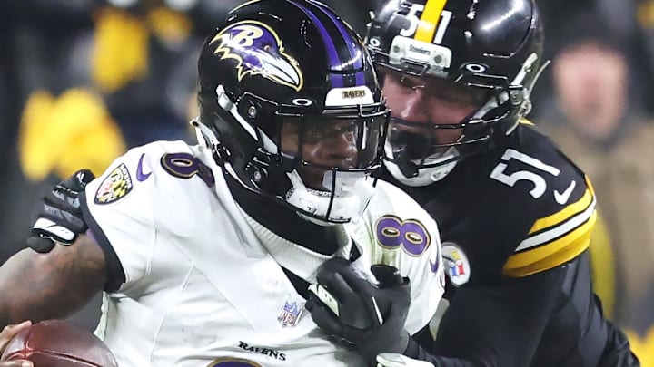 Jan 4, 2026; Pittsburgh, Pennsylvania, USA; Baltimore Ravens quarterback Lamar Jackson (8) scrambles with the ball as Pittsburgh Steelers linebacker Nick Herbig (51) cases during the fourth quarter at Acrisure Stadium. Jan 4, 2026; Pittsburgh, Pennsylvania, USA; Baltimore Ravens quarterback Lamar Jackson (8) scrambles with the ball as Pittsburgh Steelers linebacker Nick Herbig (51) cases during the fourth quarter at Acrisure Stadium.