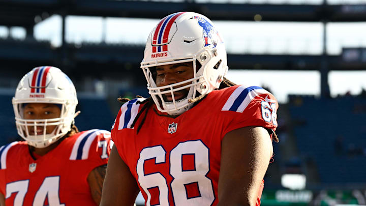 Dec 1, 2024; Foxborough, Massachusetts, USA; New England Patriots center Lecitus Smith (68) warms up before a game against the Indianapolis Colts at Gillette Stadium. Mandatory Credit: Eric Canha-Imagn Images