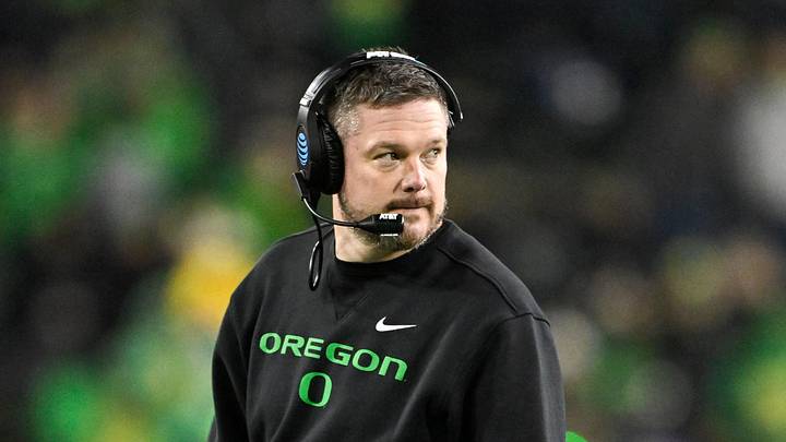 Dec 20, 2025; Eugene, OR, USA;  Oregon Ducks head coach Dan Lanning looks on during the fourth quarter against the James Madison Dukes at Autzen Stadium. Mandatory Credit: Craig Strobeck-Imagn Images