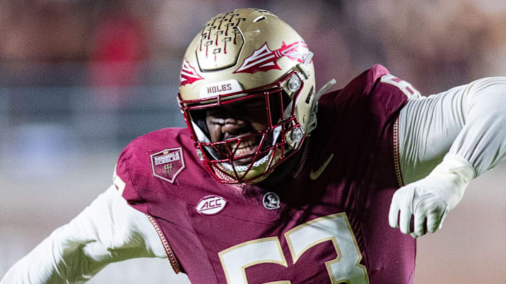Florida State Seminoles offensive lineman Jeremiah Byers (63) celebrates a first down. The Florida State Seminoles defeated the Miami Hurricanes 27-20 on Saturday, Nov. 11, 2023.