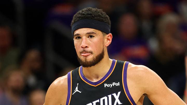 Phoenix, Arizona, USA; Phoenix Suns guard Devin Booker (1) reacts against the Portland Trail Blazers in the first half during the play-in rounds of the 2026 NBA Playoffs at Mortgage Matchup Center on Apr 14, 2026. Phoenix, Arizona, USA; Phoenix Suns guard Devin Booker (1) reacts against the Portland Trail Blazers in the first half during the play-in rounds of the 2026 NBA Playoffs at Mortgage Matchup Center on Apr 14, 2026.