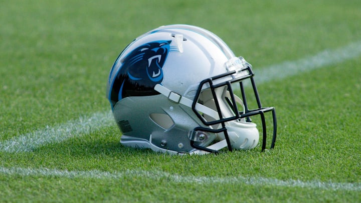 Jun 15, 2016; Charlotte, NC, USA; A Carolina Panthers helmet sits on the field at the practice field at Bank of America Stadium. Mandatory Credit: Jeremy Brevard-Imagn Images