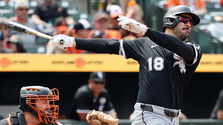 Chicago White Sox outfielder Mike Tauchman (18) hits a home run against the Baltimore Orioles at Oriole Park at Camden Yards. 