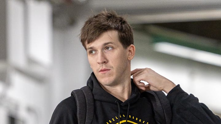Nov 14, 2025; New Orleans, Louisiana, USA;  Los Angeles Lakers guard Austin Reaves (15) arrives at the arena before the game against the New Orleans Pelicans at Smoothie King Center. Mandatory Credit: Stephen Lew-Imagn Images