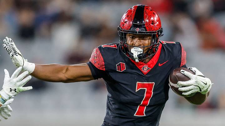 Oct 3, 2025; San Diego, California, USA; San Diego State Aztecs running back Lucky Sutton (7). Oct 3, 2025; San Diego, California, USA; San Diego State Aztecs running back Lucky Sutton (7).