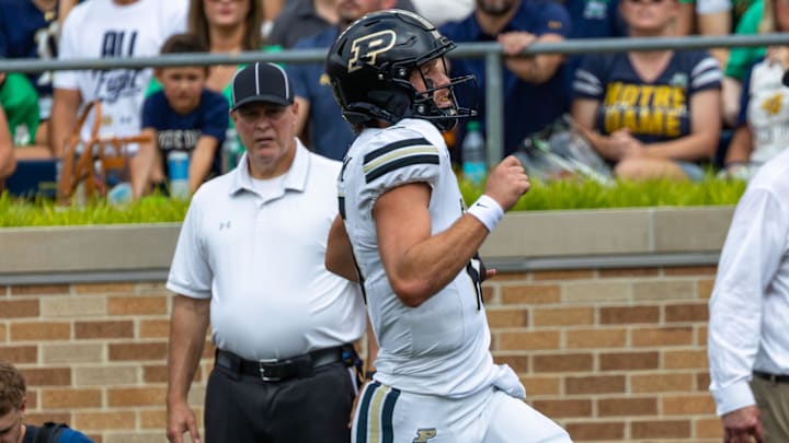 Purdue Boilermakers quarterback Ryan Browne (15) scores against the Notre Dame Fighting Irish 