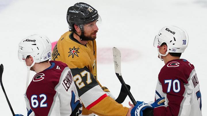 May 26, 2026; Las Vegas, Nevada, USA; Colorado Avalanche defenseman Sam Malinski (70) congratulates Vegas Golden Knights defenseman Shea Theodore (27) for the win in game four of the Western Conference Final of the 2026 Stanley Cup Playoffs at T-Mobile Arena. Mandatory Credit: Stephen R. Sylvanie-Imagn Images May 26, 2026; Las Vegas, Nevada, USA; Colorado Avalanche defenseman Sam Malinski (70) congratulates Vegas Golden Knights defenseman Shea Theodore (27) for the win in game four of the Western Conference Final of the 2026 Stanley Cup Playoffs at T-Mobile Arena. Mandatory Credit: Stephen R. Sylvanie-Imagn Images