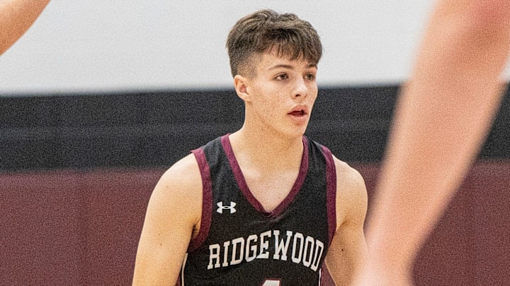 Ridgewood guard Johnny Jackson (4) in a game from last season, returned for his team's season opener on Dec. 19, despite ongoing chemotherapy treatments for Stage 4 Hodgkins Lymphoma. He scored 30 points to lead his team to victory and surpassed 2,000 career points in the process.