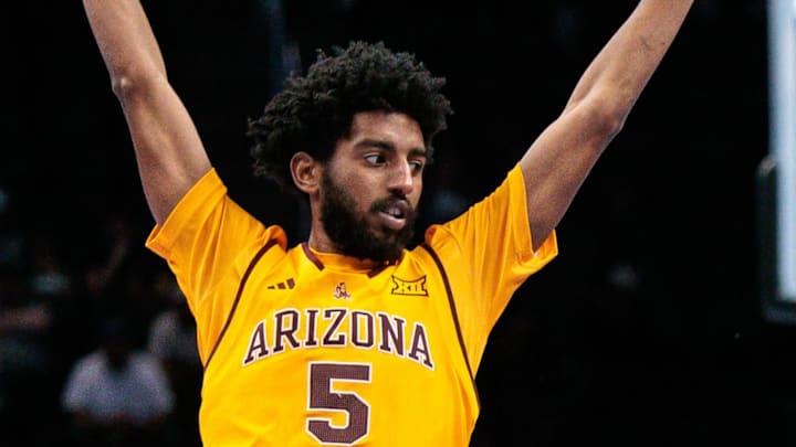 Mar 10, 2026; Kansas City, MO, USA; Baylor Bears guard Tounde Yessoufou (24) dribbles against Arizona State Sun Devils guard Maurice Odum (5) during the second half at T-Mobile Center. Mandatory Credit: William Purnell-Imagn Images