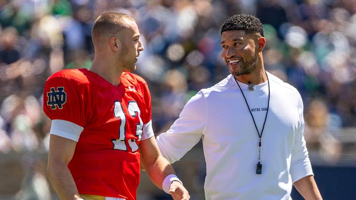 Apr 25, 2026; Notre Dame, IN, USA; Notre Dame Fighting Irish head coach Marcus Freeman talks with quarterback CJ Carr (13) during the Blue-Gold game at Notre Dame Stadium. Apr 25, 2026; Notre Dame, IN, USA; Notre Dame Fighting Irish head coach Marcus Freeman talks with quarterback CJ Carr (13) during the Blue-Gold game at Notre Dame Stadium.