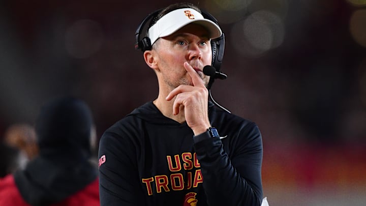 Nov 7, 2025; Los Angeles, California, USA; Southern California Trojans head coach Lincoln Riley watches game action against the Northwestern Wildcats during the second half at the Los Angeles Memorial Coliseum. Mandatory Credit: Gary A. Vasquez-Imagn Images