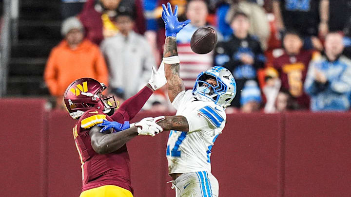 Washington Commanders wide receiver Deebo Samuel (1) makes a catch against Detroit Lions cornerback Arthur Maulet (27) Washington Commanders wide receiver Deebo Samuel (1) makes a catch against Detroit Lions cornerback Arthur Maulet (27)