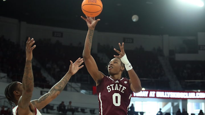 Feb 7, 2026; Starkville, Mississippi, USA; Mississippi State Bulldogs forward Jamarion Davis-Fleming (0) shoots over Arkansas Razorbacks forward Nick Pringle (23) during the second half at Humphrey Coliseum. Mandatory Credit: Petre Thomas-Imagn Images