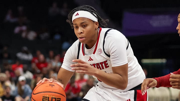 Nov 9, 2025; Charlotte, North Carolina, USA; NC State Wolfpack guard Zoe Brooks (35) drives the ball against the Southern California Trojans during the second quarter of the Ally Tipoff game at Spectrum Center. Mandatory Credit: Cory Knowlton-Imagn Images Nov 9, 2025; Charlotte, North Carolina, USA; NC State Wolfpack guard Zoe Brooks (35) drives the ball against the Southern California Trojans during the second quarter of the Ally Tipoff game at Spectrum Center. Mandatory Credit: Cory Knowlton-Imagn Images