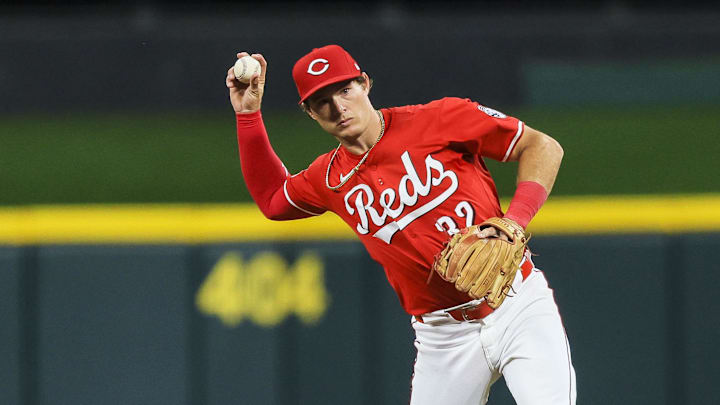 Apr 30, 2025; Cincinnati, Ohio, USA; Cincinnati Reds second baseman Tyler Callihan (32) throws to first to get St. Louis Cardinals catcher Pedro Pages (not pictured) out in the eighth inning at Great American Ball Park. Mandatory Credit: Katie Stratman-Imagn Images