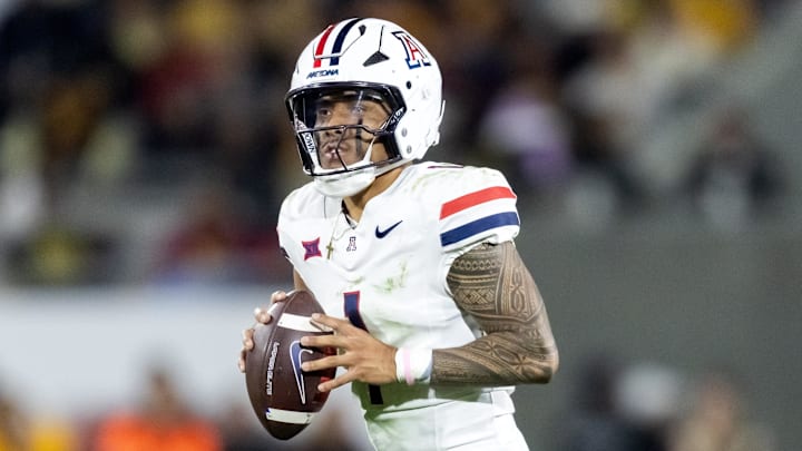 Nov 28, 2025; Tempe, Arizona, USA; Arizona Wildcats quarterback Noah Fifita (1) against the Arizona State Sun Devils during the 99th Territorial Cup at Mountain America Stadium. Mandatory Credit: Mark J. Rebilas-Imagn Images Nov 28, 2025; Tempe, Arizona, USA; Arizona Wildcats quarterback Noah Fifita (1) against the Arizona State Sun Devils during the 99th Territorial Cup at Mountain America Stadium. Mandatory Credit: Mark J. Rebilas-Imagn Images
