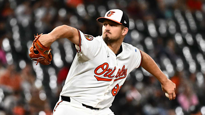 Aug 21, 2025; Baltimore, Maryland, USA;  Baltimore Orioles pitcher Grant Wolfram (86) delivers a pitch during the seventh inning against the Houston Astros at Oriole Park at Camden Yards. Mandatory Credit: James A. Pittman-Imagn Images