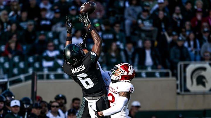 Michigan State's Nick Marsh, left, makes a catch as Indiana's Terry Jones Jr. defends during the first quarter on Saturday, Nov. 2, 2024, at Spartan Stadium in East Lansing. Michigan State's Nick Marsh, left, makes a catch as Indiana's Terry Jones Jr. defends during the first quarter on Saturday, Nov. 2, 2024, at Spartan Stadium in East Lansing.