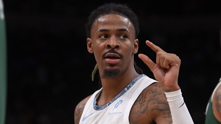 Dec 26, 2025; Memphis, Tennessee, USA; Memphis Grizzlies guard Ja Morant (12) gestures during the third quarter against the Milwaukee Bucks at FedExForum. Mandatory Credit: Petre Thomas-Imagn Images