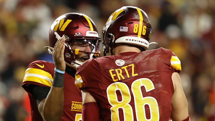 Dec 29, 2024; Landover, Maryland, USA; Washington Commanders quarterback Jayden Daniels (5) celebrates with Commanders tight end Zach Ertz (86) after connecting on a touchdown pass against the Atlanta Falcons during the third quarter at Northwest Stadium. Mandatory Credit: Geoff Burke-Imagn Images Dec 29, 2024; Landover, Maryland, USA; Washington Commanders quarterback Jayden Daniels (5) celebrates with Commanders tight end Zach Ertz (86) after connecting on a touchdown pass against the Atlanta Falcons during the third quarter at Northwest Stadium. Mandatory Credit: Geoff Burke-Imagn Images