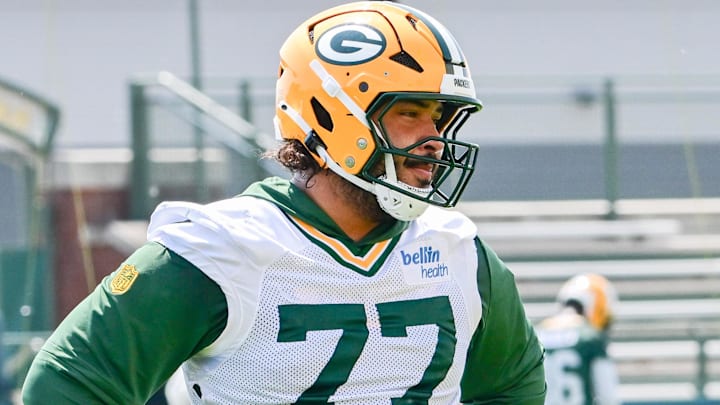 Jun 11, 2025; Green Bay, WI, USA;  Green Bay Packers offensive tackle Jordan Morgan (77) participates in the team's minicamp at Ray Nitschke Field.