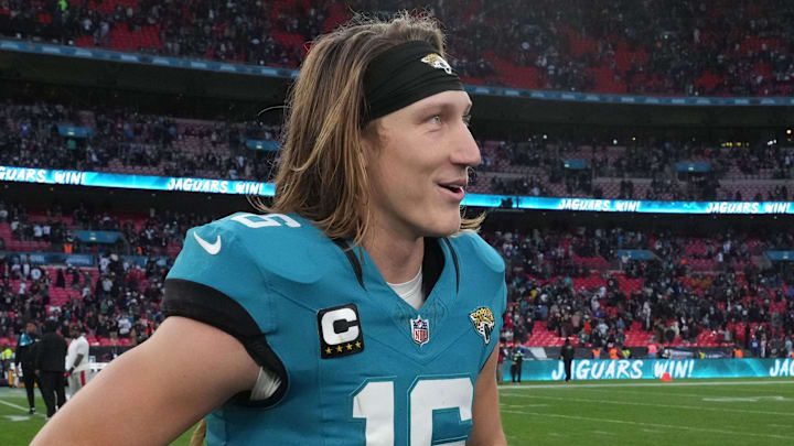 Oct 20, 2024; London, United Kingdom; NFL Network reporter Steve Wyche (right) interviews Jacksonville Jaguars quarterback Trevor Lawrence (16) after an NFL International Series game at Wembley Stadium. Mandatory Credit: Kirby Lee-Imagn Images
