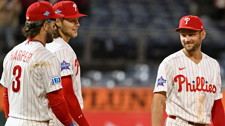 Apr 28, 2026; Philadelphia, Pennsylvania, USA; Philadelphia Phillies shortstop Trea Turner (7) celebrates win against the San Francisco Giants with first baseman Bryce Harper (3) and third baseman Alec Bohm (28) during the sixth inning at Citizens Bank Park.