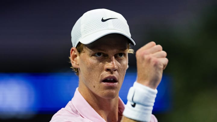 Jannik Sinner reacts after a point