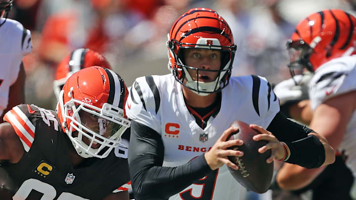 Cleveland Browns defensive end Myles Garrett (95) chases down Cincinnati Bengals quarterback Joe Burrow (9) during the first half of an NFL football game at Huntington Bank Field, Sept. 7, 2025, in Cleveland, Ohio.