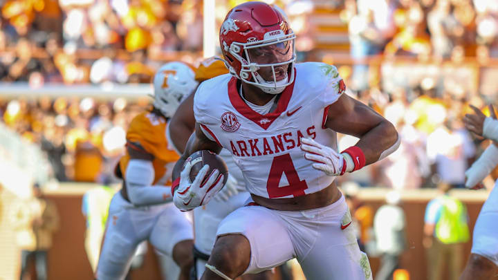 Arkansas Razorbacks running back Mike Washington runs the ball against the Tennessee Volunteers.