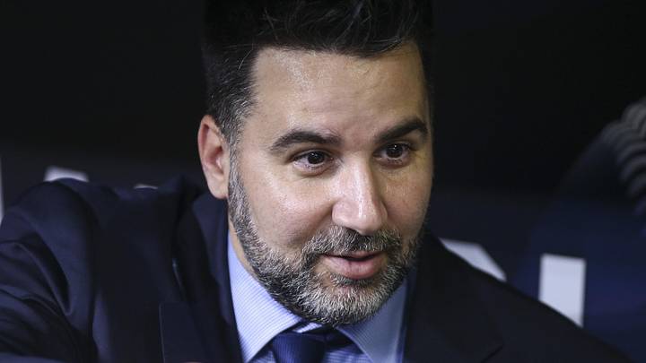Oct 25, 2021; Houston, Texas, USA;  Atlanta Braves general manager Alex Anthopoulos talks in the dugout during workouts before Game 1 of the World Series between the Houston Astros and the Atlanta Braves at Minute Maid Park. Mandatory Credit: Troy Taormina-Imagn Images