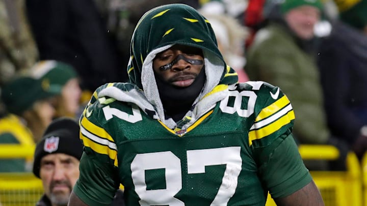 Green Bay Packers wide receiver Romeo Doubs (87) leaves the field after getting injured on a pass interference play commited by San Francisco 49ers cornerback Renardo Green (0) in the third quarter during their football game Sunday, November 24, 2024, at Lambeau Field in Green Bay, Wisconsin.