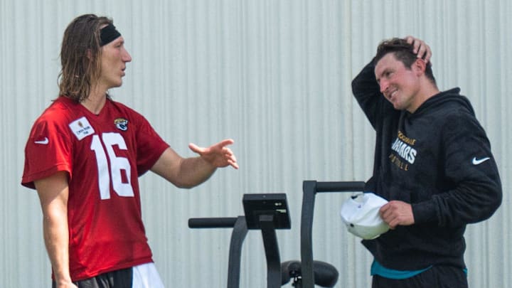Jacksonville Jaguars quarterback Trevor Lawrence (16) talks with Jacksonville Jaguars offensive coordinator Grant Udinski after the Jaguar’s 12th NFL training camp session at the Miller Electric Center, Thursday, Aug. 7, 2025, in Jacksonville, Fla. [Doug Engle/Florida Times-Union]