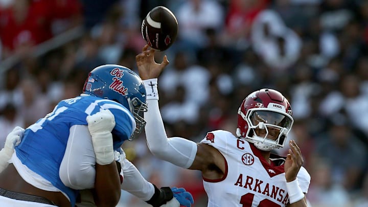 Arkansas Razorbacks quarterback Taylen Green (10) passes the ball as Ole Miss Rebels defensive lineman Zxavian Harris (51) attempts to break up the pass during the first quarter at Vaught-Hemingway Stadium in Oxford, Miss. Arkansas Razorbacks quarterback Taylen Green (10) passes the ball as Ole Miss Rebels defensive lineman Zxavian Harris (51) attempts to break up the pass during the first quarter at Vaught-Hemingway Stadium in Oxford, Miss.