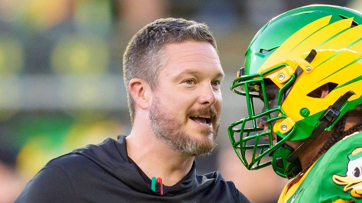 Sept. 18, 2026; Eugene, OR; Oregon coach Dan Lanning talks with offensive lineman Dave Iuli as the Oregon Ducks host the Portland State Vikings at Autzen Stadium Sept. 18, 2026; Eugene, OR; Oregon coach Dan Lanning talks with offensive lineman Dave Iuli as the Oregon Ducks host the Portland State Vikings at Autzen Stadium