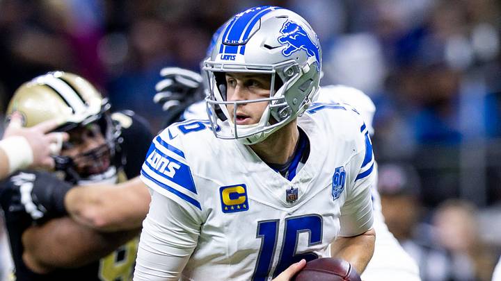 Dec 3, 2023; New Orleans, Louisiana, USA; Detroit Lions quarterback Jared Goff (16) rolls out the pocket to pass the ball against the New Orleans Saints during the second half at the Caesars Superdome. Mandatory Credit: Stephen Lew-USA TODAY Sports