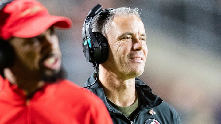Florida State Seminoles head coach Mike Norvell smiles after his players score a touchdown. The Florida State Seminoles defeated the Miami Hurricanes 27-20 on Saturday, Nov. 11, 2023.
