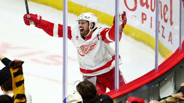 Feb 26, 2026; Ottawa, Ontario, CAN; Detroit Red Wings center Dylan Larkin (71) celebrates after scoring in overtime against the Ottawa Senators at Canadian Tire Centre. Mandatory Credit: Keito Newman-Imagn Images