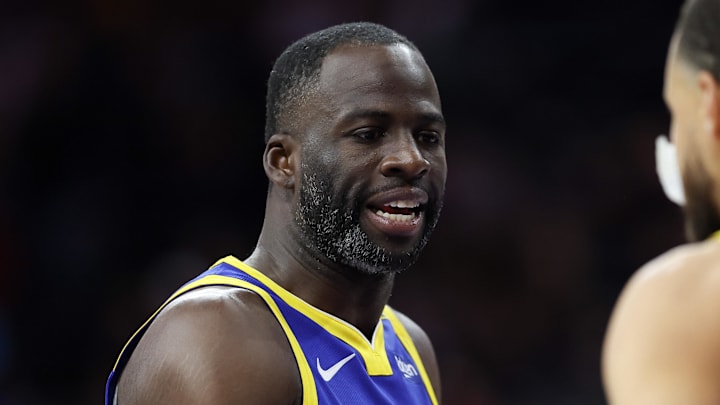 Mar 1, 2025; Philadelphia, Pennsylvania, USA; Golden State Warriors forward Draymond Green (23) shakes hands with guard Stephen Curry (30) during the first quarter against the Philadelphia 76ers at Wells Fargo Center. Mandatory Credit: Bill Streicher-Imagn Images