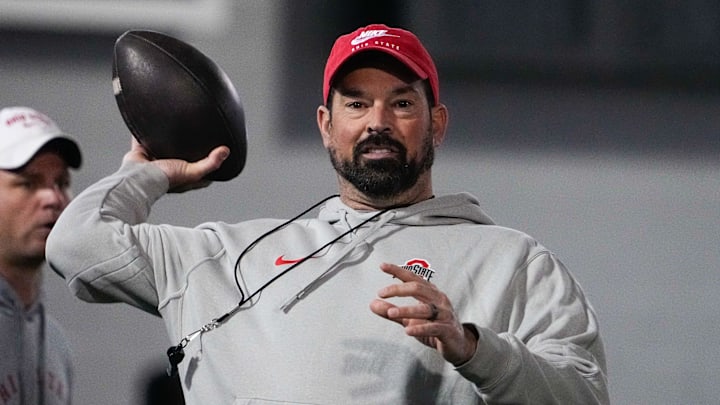 Ohio State Buckeyes head coach Ryan Day makes a pass during spring football practice at the Woody Hayes Athletic Center on Wednesday, March 19, 2025 in Columbus, Ohio. Ohio State Buckeyes head coach Ryan Day makes a pass during spring football practice at the Woody Hayes Athletic Center on Wednesday, March 19, 2025 in Columbus, Ohio.