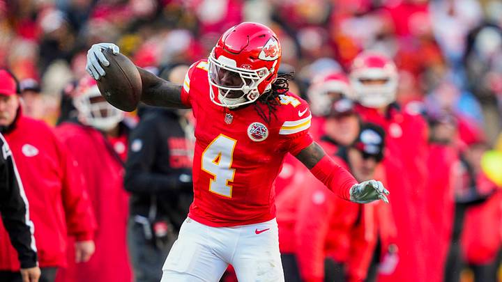 Dec 14, 2025; Kansas City, Missouri, USA; Kansas City Chiefs wide receiver Rashee Rice (4) runs with the ball against Los Angeles Chargers cornerback Benjamin St-Juste (24) during the first half at GEHA Field at Arrowhead Stadium. Mandatory Credit: Jay Biggerstaff-Imagn Images Dec 14, 2025; Kansas City, Missouri, USA; Kansas City Chiefs wide receiver Rashee Rice (4) runs with the ball against Los Angeles Chargers cornerback Benjamin St-Juste (24) during the first half at GEHA Field at Arrowhead Stadium. Mandatory Credit: Jay Biggerstaff-Imagn Images