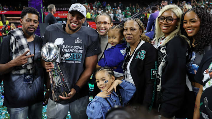 Former Penn State football and current Philadelphia Eagles running back Saquon Barkley celebrates Super Bowl LIX with family
