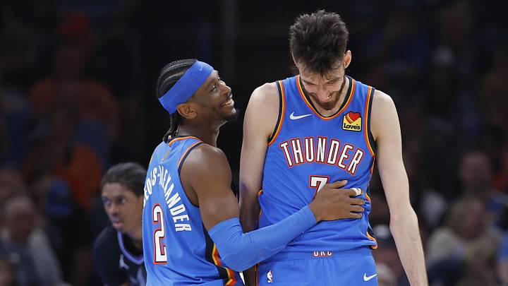 Apr 5, 2026; Oklahoma City, Oklahoma, USA; Oklahoma City Thunder guard Shai Gilgeous-Alexander (2) and center Chet Holmgren (7) laugh after a play against the Utah Jazz during the second half at Paycom Center. Mandatory Credit: Alonzo Adams-Imagn Images